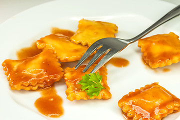 Image showing Ravioli with fork