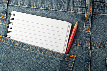 Image showing Notepad and pencil in jeans pocket