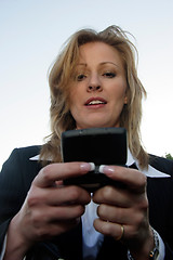 Image showing Business woman checking message