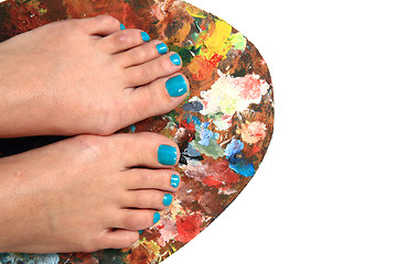 Image showing women feet (pedicure)  with color palette 