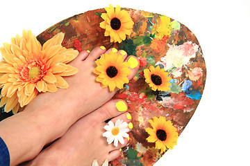 Image showing women feet (pedicure)  with flowers