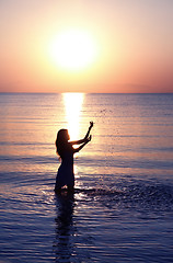 Image showing Woman at sunset