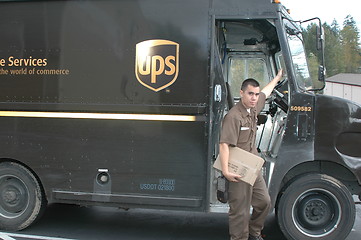 Image showing Ups truck and driver.