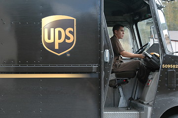 Image showing Ups truck and driver.