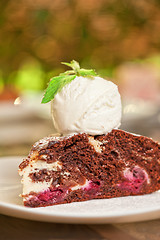 Image showing chocolate cake with jam ice cream