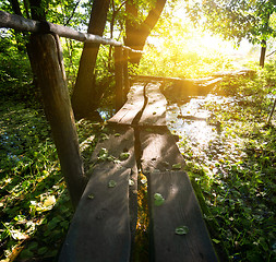 Image showing Sun over little bridge