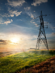 Image showing Electric pole and autumn field