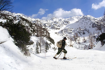 Image showing Skier with vintage skis