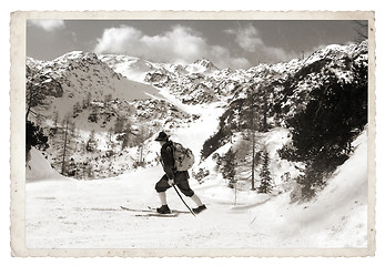 Image showing Skier with vintage skis