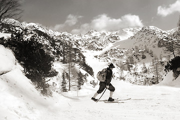 Image showing Skier with vintage skis