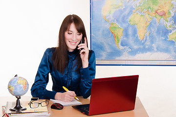 Image showing Office manager travel agency on the phone