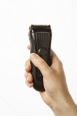 Image showing beard clipper in hand