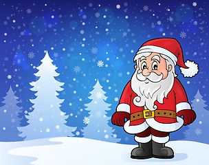 Image showing Santa Claus standing in snow