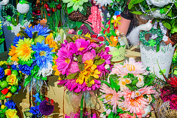 Image showing Artificial flowers, made from a material different Souvenirs and