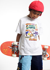 Image showing Sad boy holding a skateboard