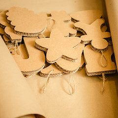 Image showing Cardboard toys for the Christmas tree or garland. Creative decorations. Selective Focus