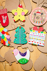 Image showing Cardboard toys for the Christmas tree or garland. New year decorations.