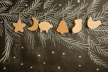 Image showing Cardboard toys for the Christmas tree or garland. Creative decorations. Selective Focus