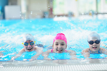 Image showing children group  at swimming pool