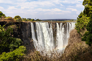 Image showing The Victoria falls with mist from water