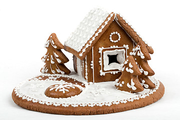 Image showing Holiday Gingerbread house isolated on white. 