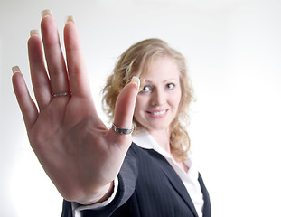 Image showing Woman holding hand up