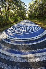 Image showing Peace signs on the road demonstrate a peaceful resistance to com