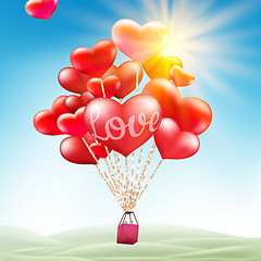 Image showing Couple in hot air hearts balloons. EPS 10