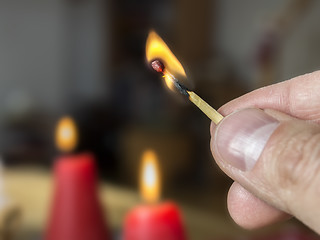 Image showing burning match