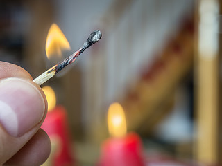 Image showing burning match