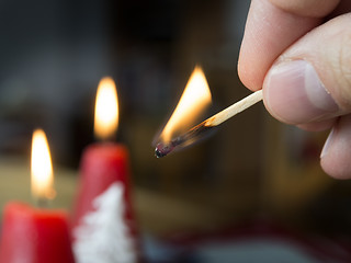 Image showing burning match