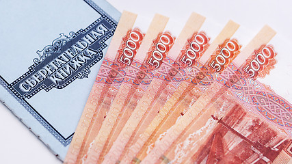 Image showing Saving deposit bank book and money