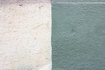 Image showing closeup of two colors plaster on wall