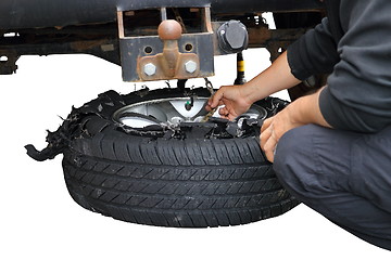 Image showing changing exploded truck wheel