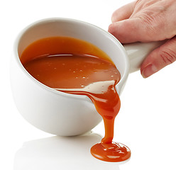 Image showing bowl of melted caramel sauce