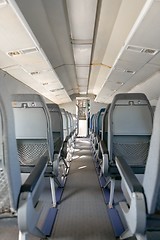 Image showing Interior of an airplane with many seats