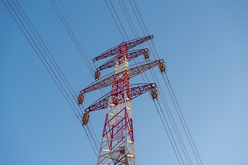 Image showing Large transmission towers at sunset