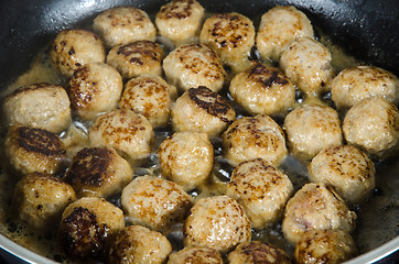 Image showing Frying meatballs