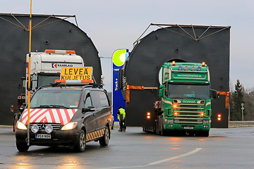 Image showing Pilot Car and Two Trucks with Oversize Loads
