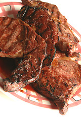 Image showing four rib eyes