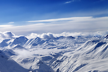 Image showing Snow plateau and sky with clouds