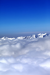 Image showing Cloudy mountains at nice winter day