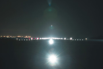 Image showing Landing lights at the airport runway