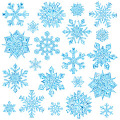 Image showing Set of light blue crystal snowflakes isolated on white