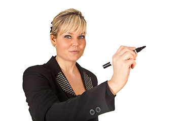 Image showing Studio portrait of a cute blond girl writing on a transparent wa