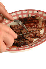 Image showing cutting the steak