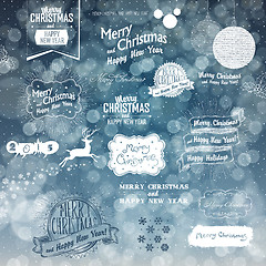 Image showing Merry Christmas And Happy New Year Elements on Blue Defocused Ba