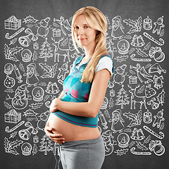 Image showing Pregnant Woman Looking For Christmas Gifts