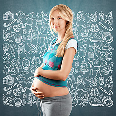 Image showing Pregnant Woman Looking For Christmas Gifts