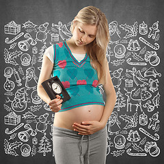 Image showing Pregnant Woman Looking For Christmas Gifts